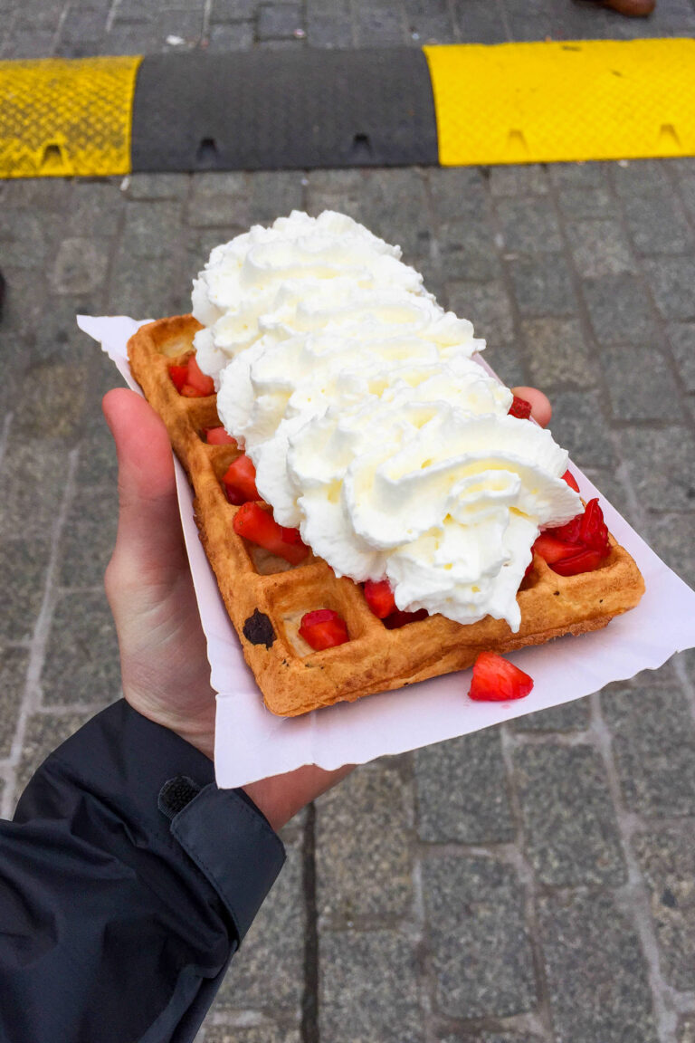 Waffle with strawberries and cream